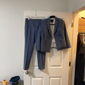 Slate blue double breasted suit coat and pants.